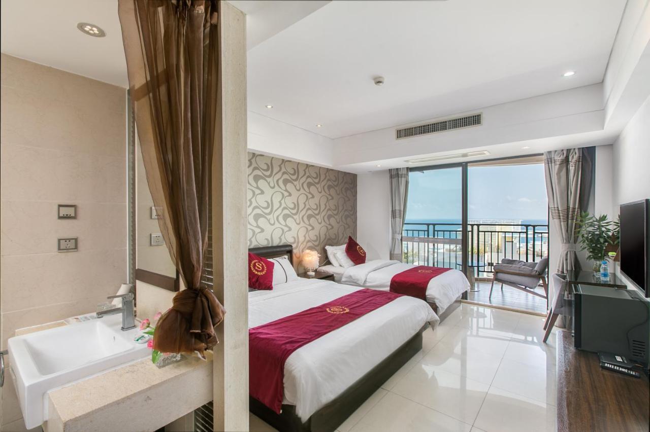 Апарт отель Sanya Sun And Sea Gueshouse Экстерьер фото
