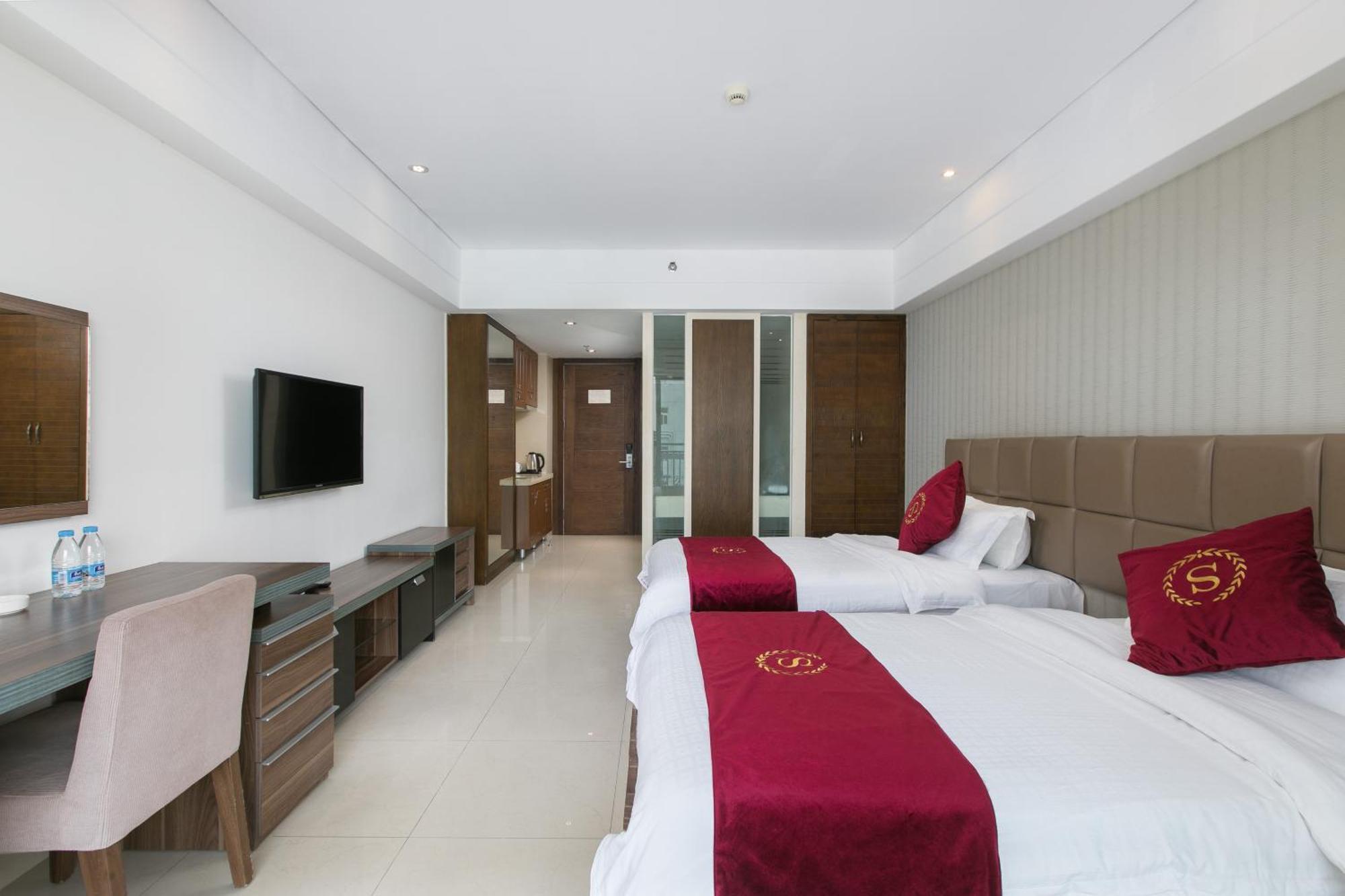 Апарт отель Sanya Sun And Sea Gueshouse Номер фото