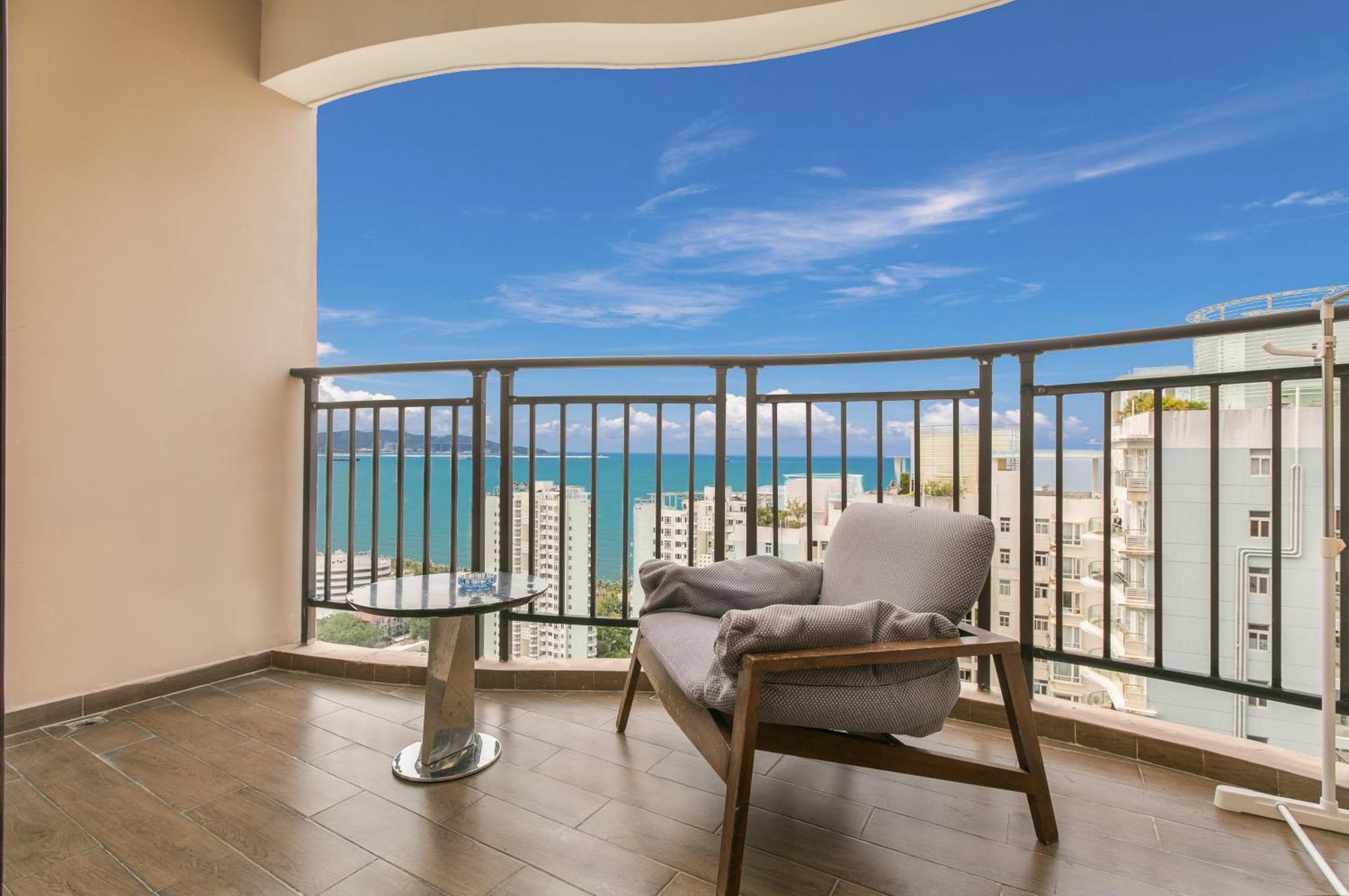 Апарт отель Sanya Sun And Sea Gueshouse Номер фото