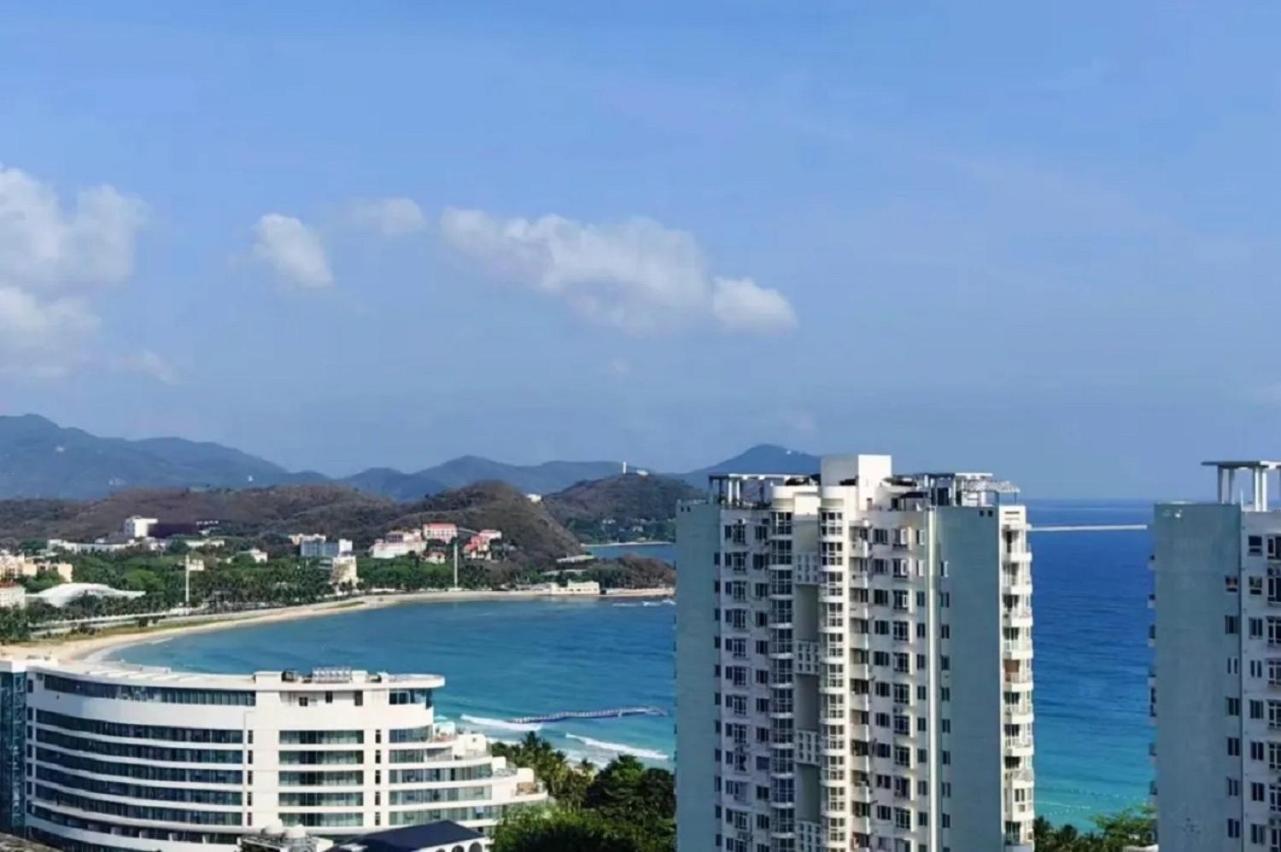 Апарт отель Sanya Sun And Sea Gueshouse Экстерьер фото