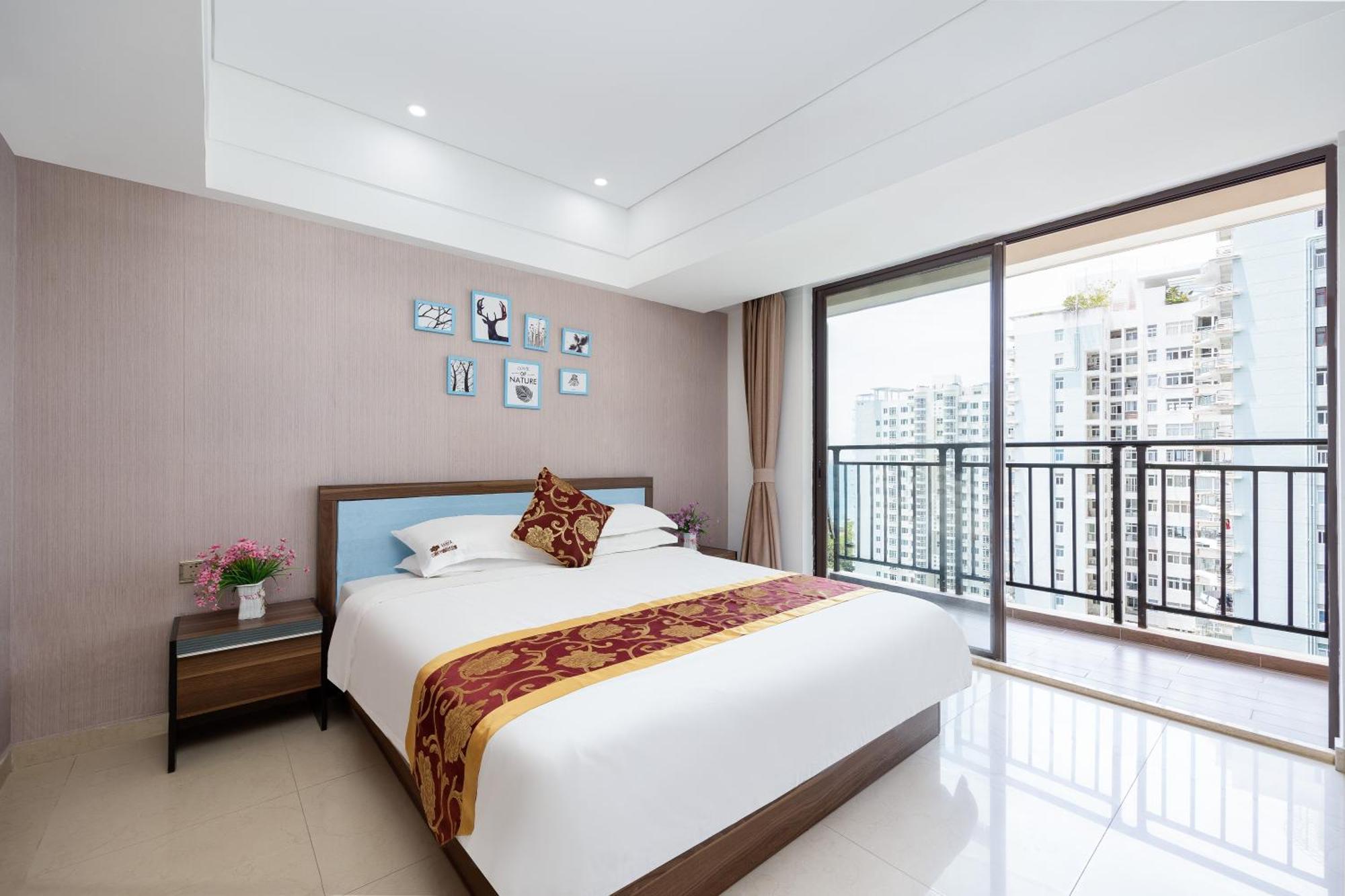 Апарт отель Sanya Sun And Sea Gueshouse Экстерьер фото