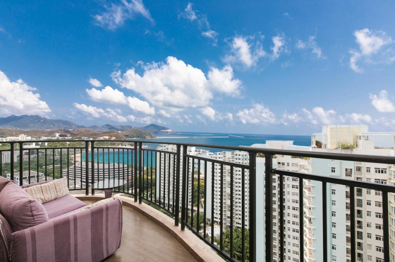 Апарт отель Sanya Sun And Sea Gueshouse Экстерьер фото