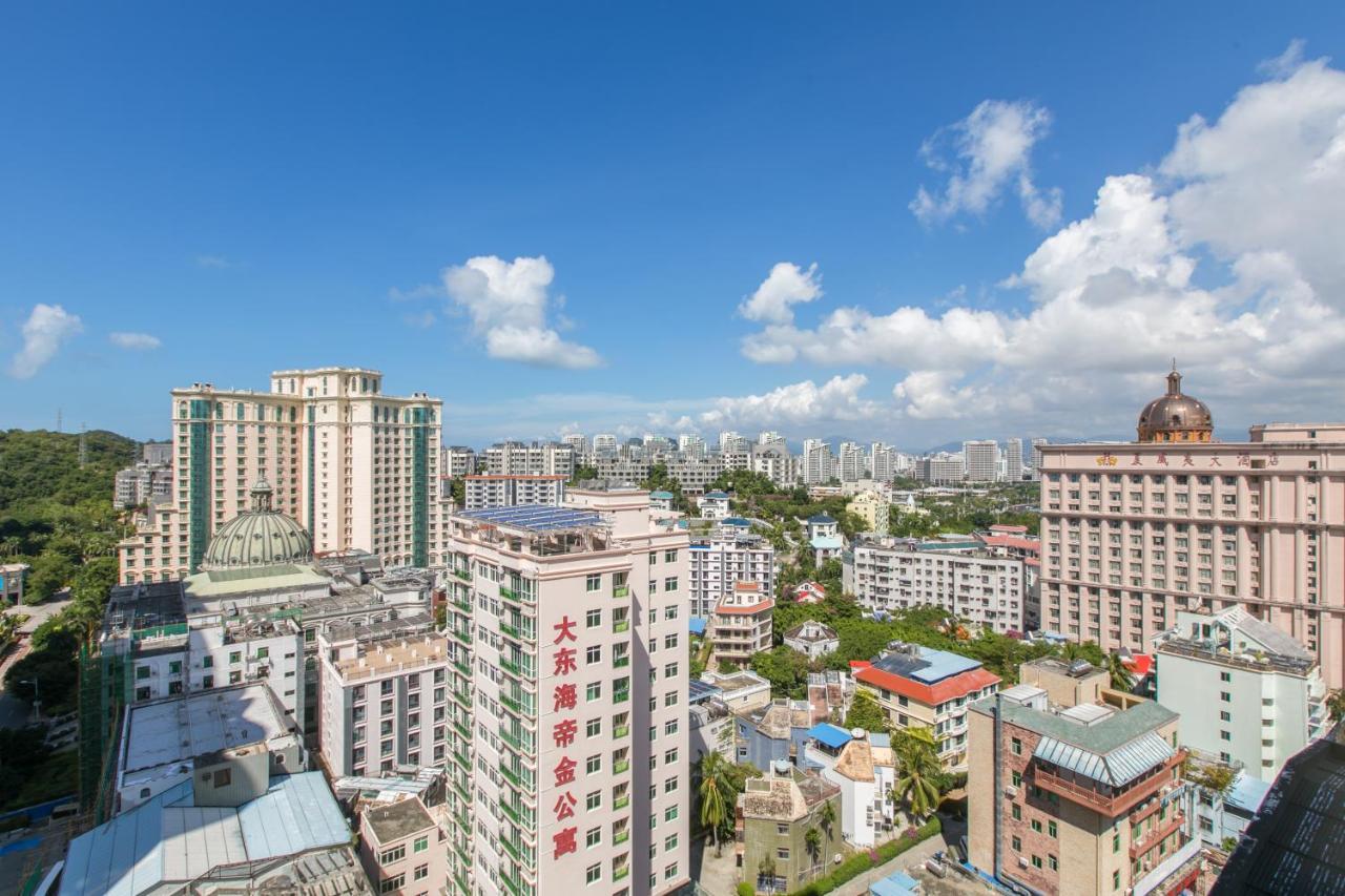 Апарт отель Sanya Sun And Sea Gueshouse Экстерьер фото