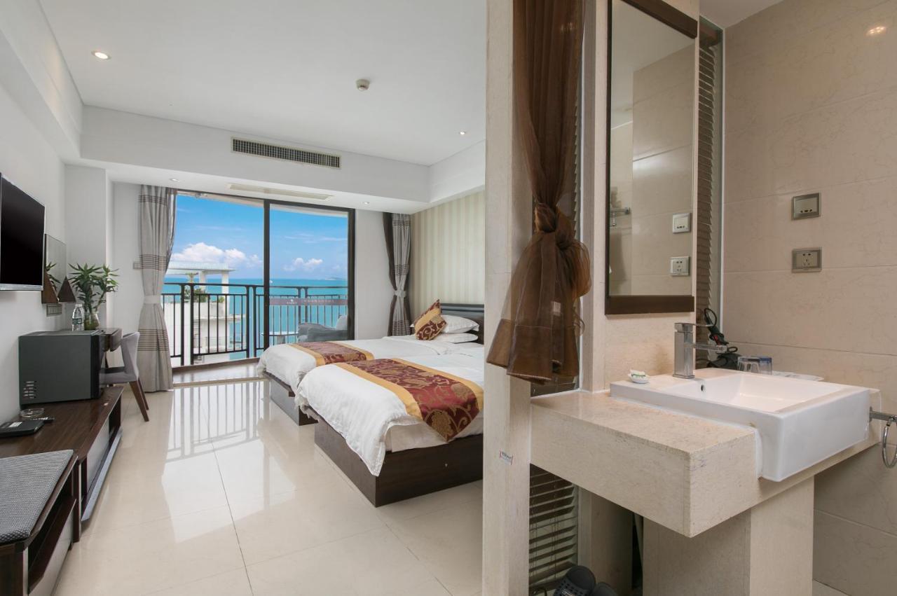 Апарт отель Sanya Sun And Sea Gueshouse Экстерьер фото